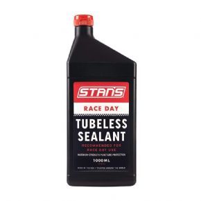 Stans No Tubes Race Day Tyre Sealant 1000ml - QuickClick mountable pack keeps phone close at hand.